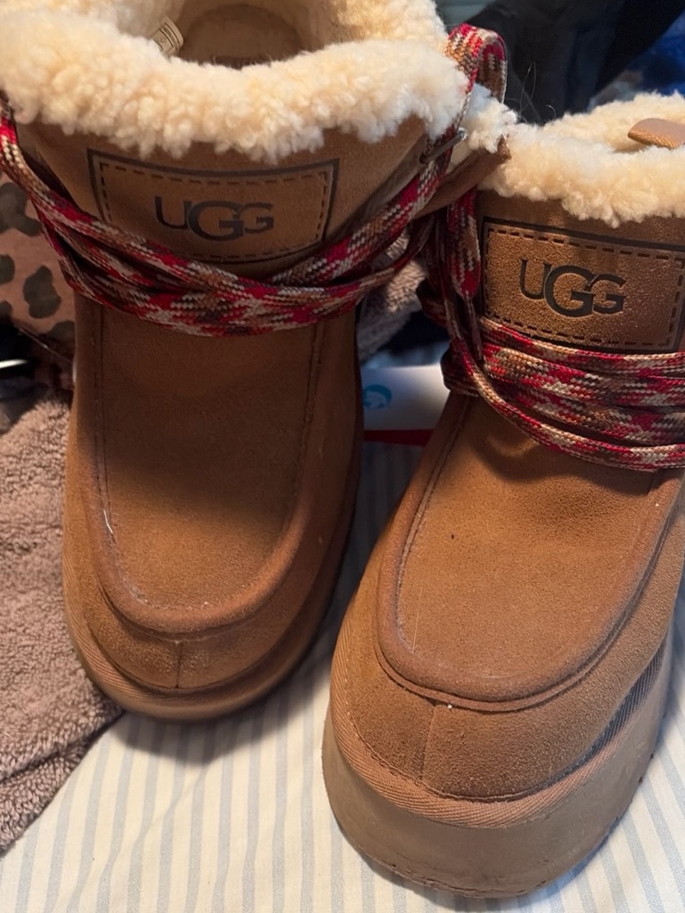 UGG women’s Chestnut Suede Shearling Boots with Red Accent Laces